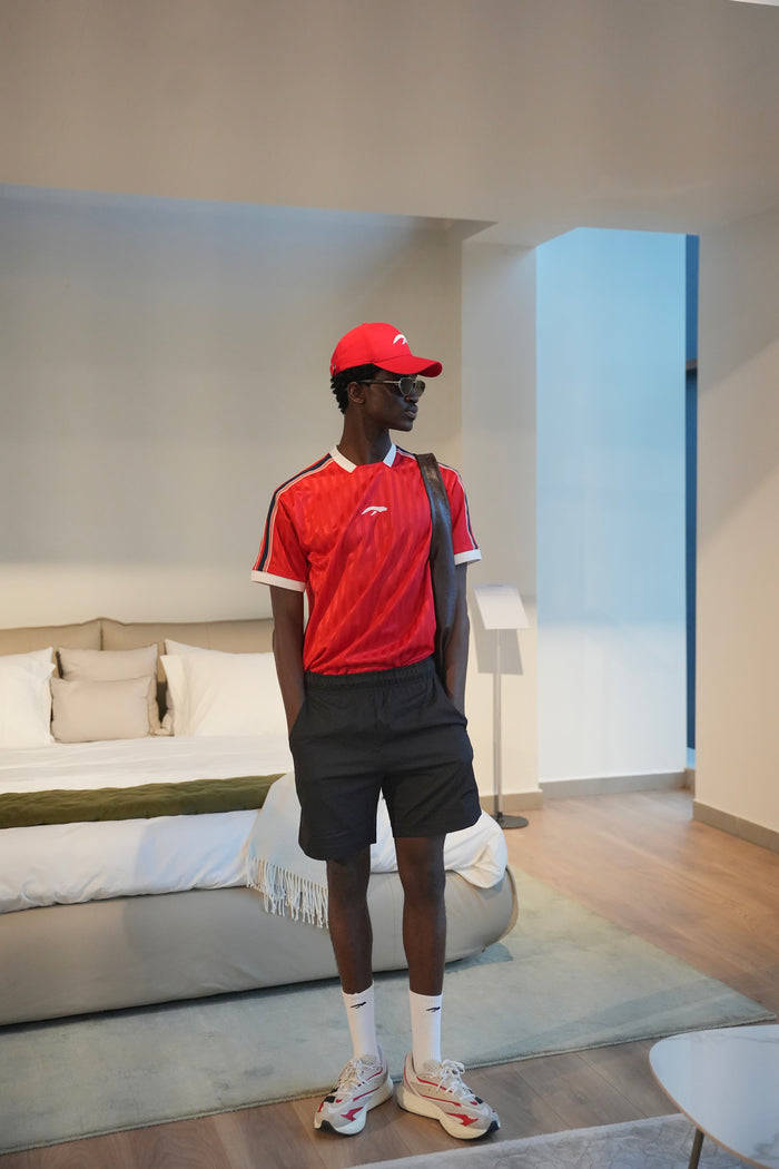 Styled with the Noir Shorts, signature AuraUP Socks and the AuraUP Panel Cap.